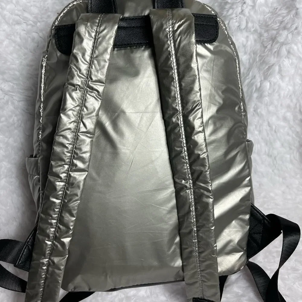 Juicy Couture Metallic quilted silver Backpack with black trim. - Picture 2 of 16